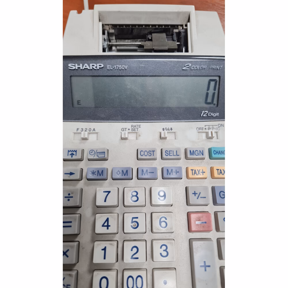 ¿Cómo encender una calculadora Sharp?